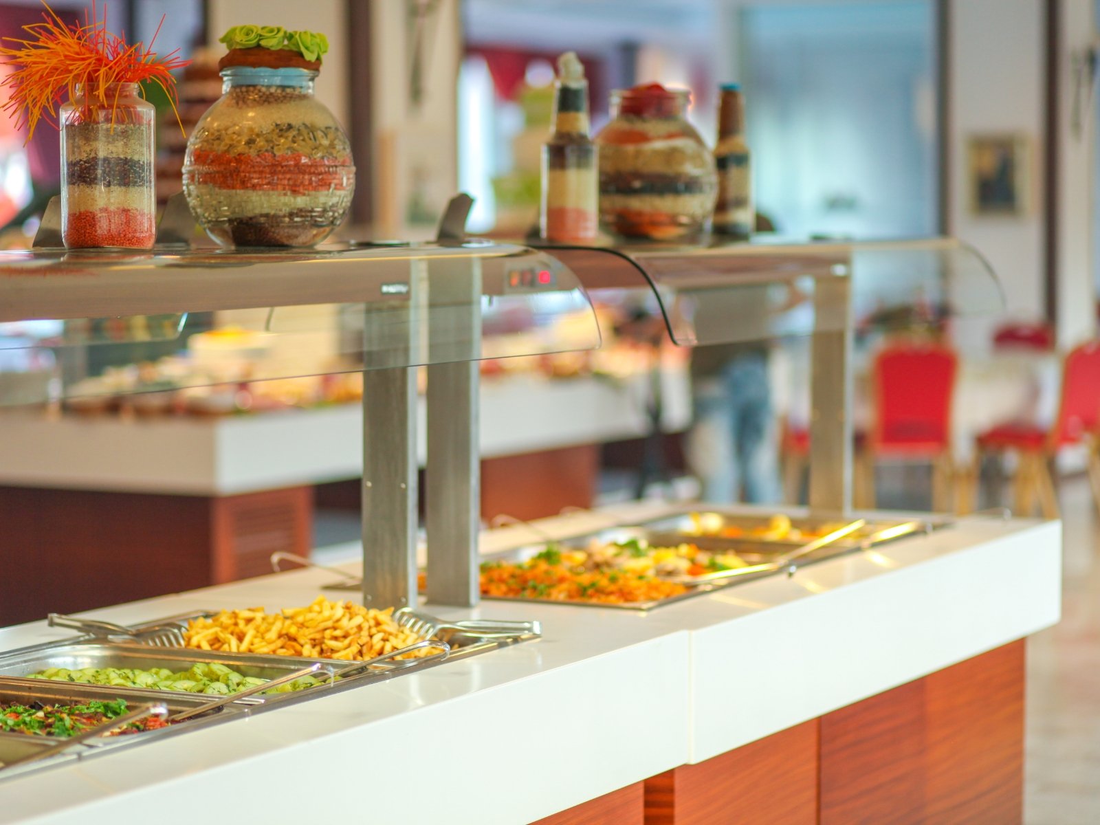 Buffet dining setup with Indian food at a safari lodge